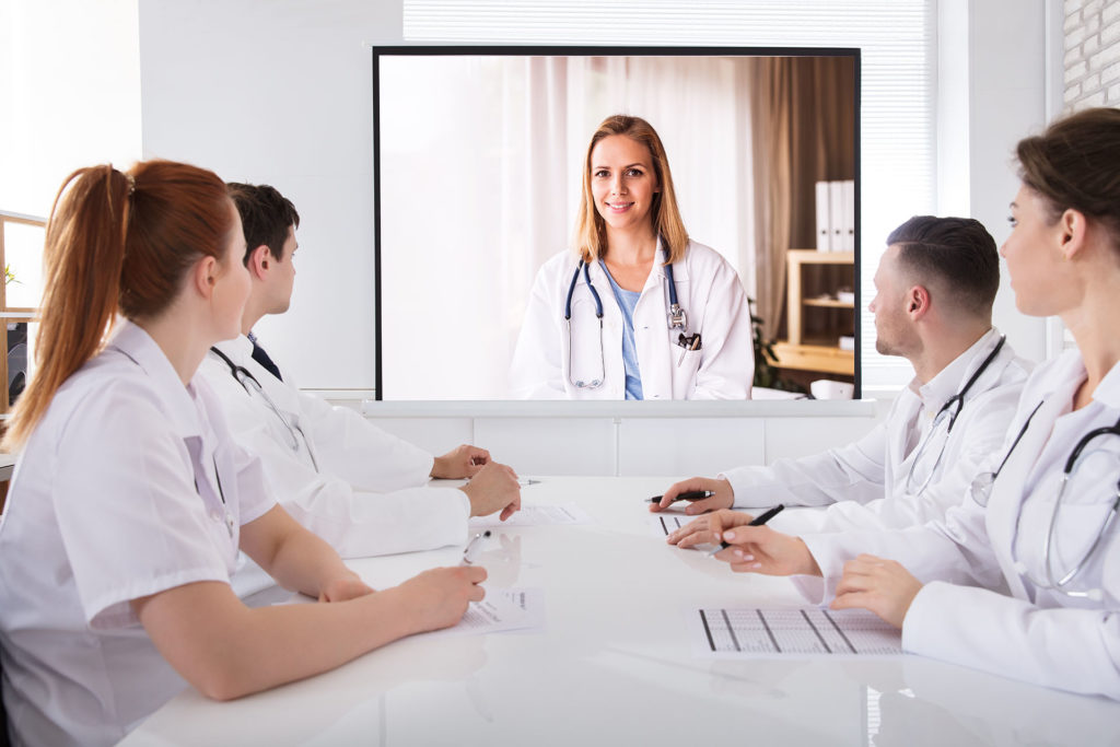 Doctor's Having Video Conference
